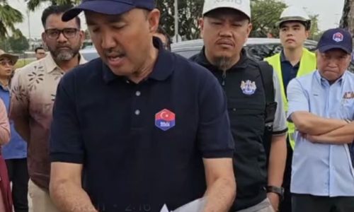 A video still showing Jafni verifying some information during the morning site visit.